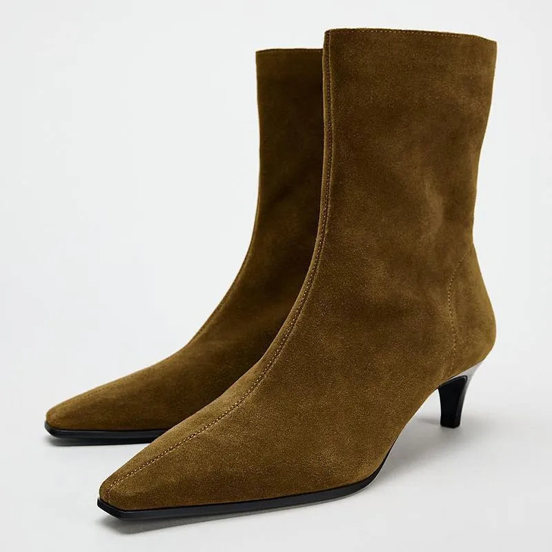 Women's brown square toe ankle booties with a side zipper and stiletto mid heel