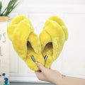 Cross open-toe fur slippers in multiple colours showing patterned sole and anatomical heel.