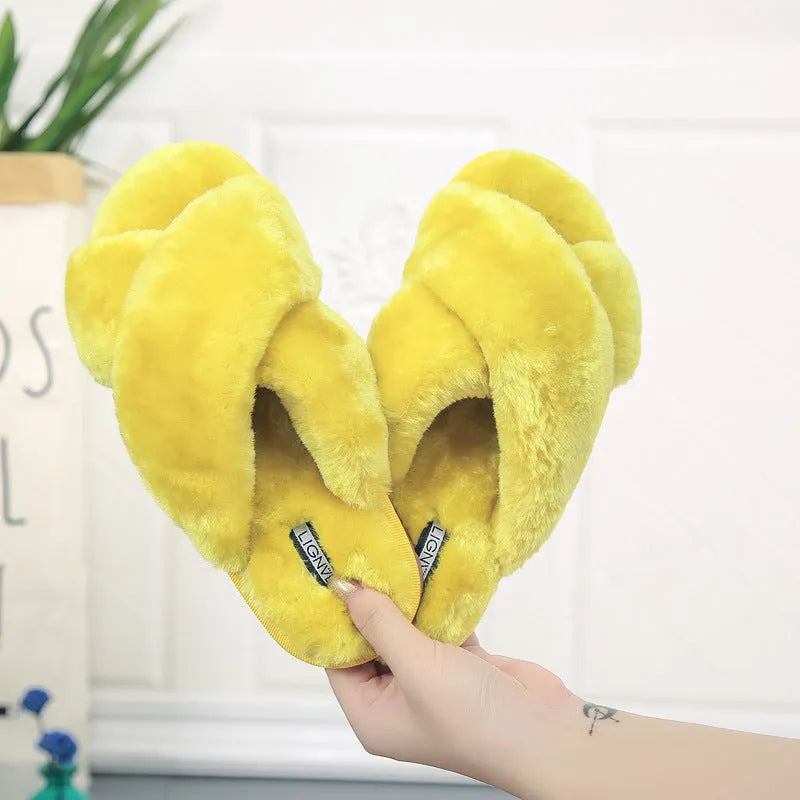 Cross open-toe fur slippers in multiple colours showing patterned sole and anatomical heel.