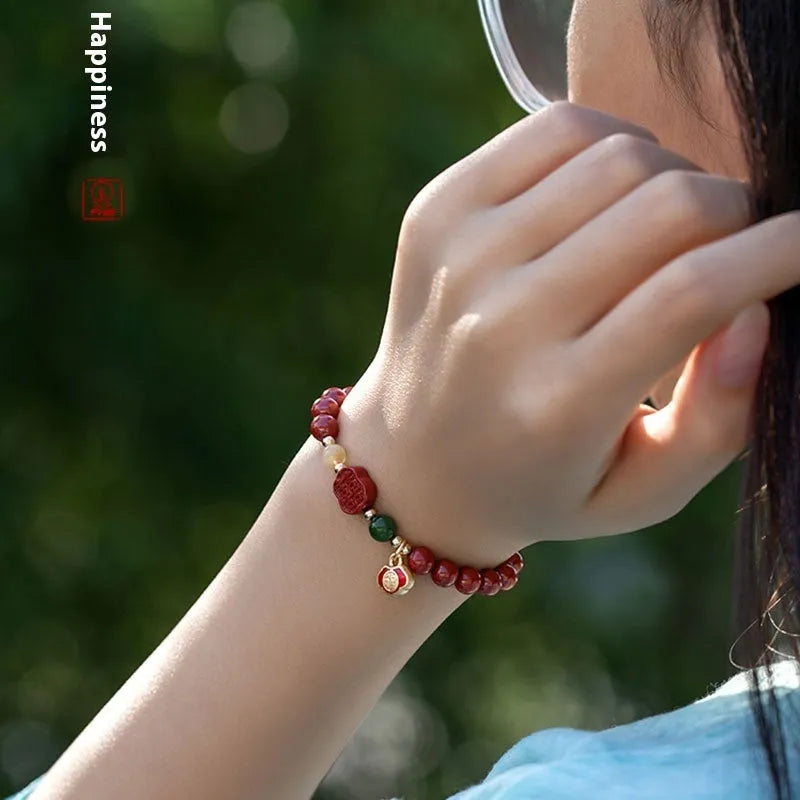 Emperor Sandstone cinnabar bracelet with fu character charm in 6mm and 8mm bead sizes