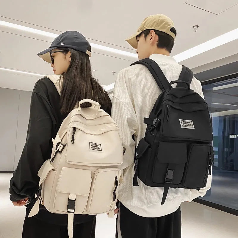 Soft black and white student backpack with laptop compartment and 3D pocket