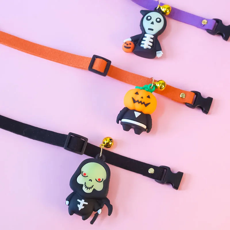 Halloween dog collar decoration showing luminous cartoon skull design on an adjustable polyester strap.