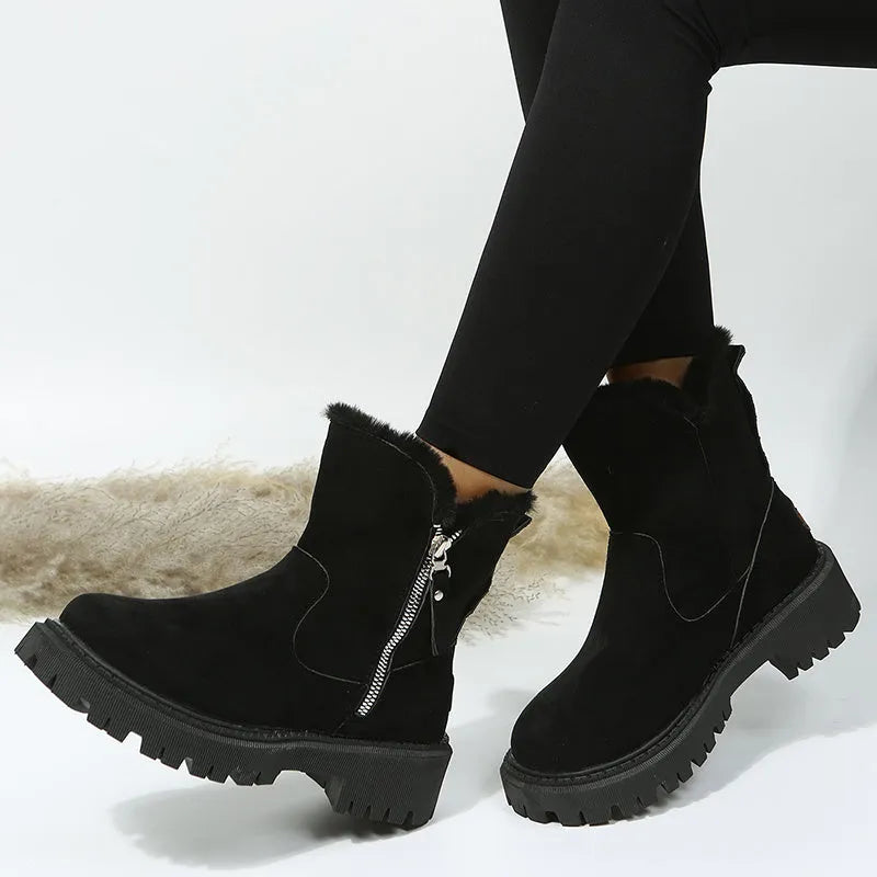 Women's black thick plush snow boots with side zipper, faux suede upper, and non-slip rubber sole.