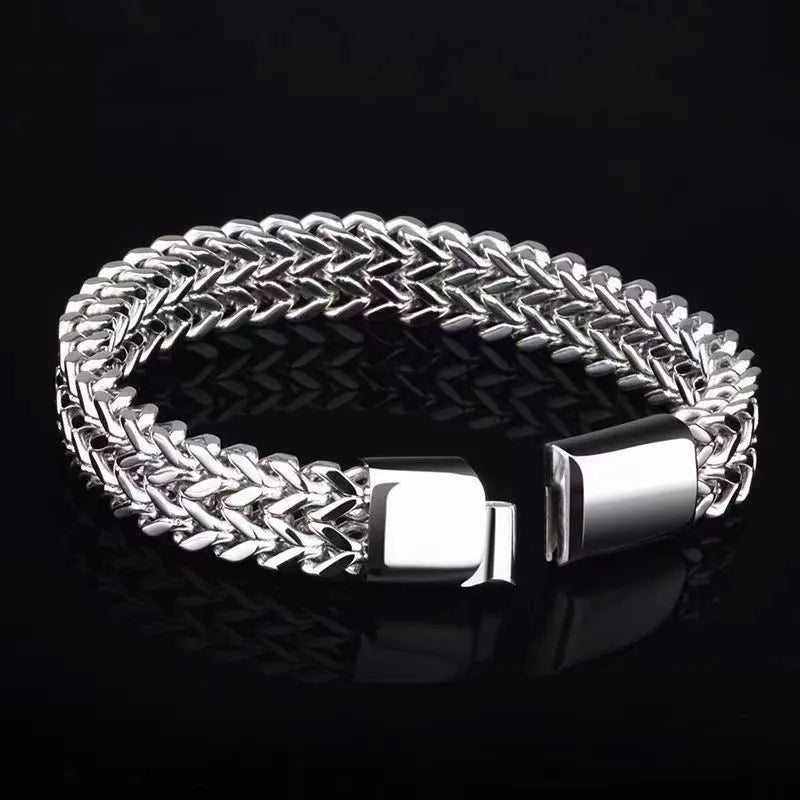 Geometric stainless steel bracelet with front and back detailing in silver colour