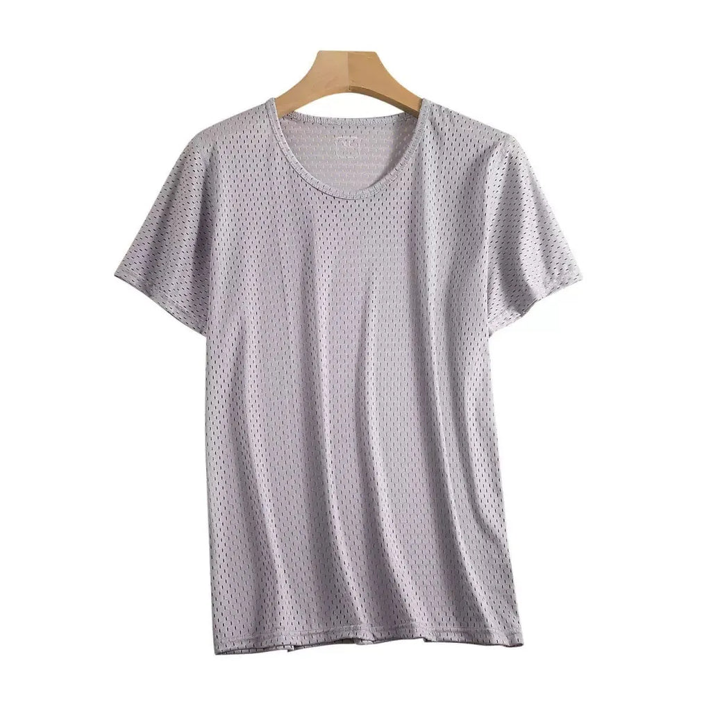 Man wearing a solid colour ice silk short sleeve crew neck t-shirt in a loose fit.
