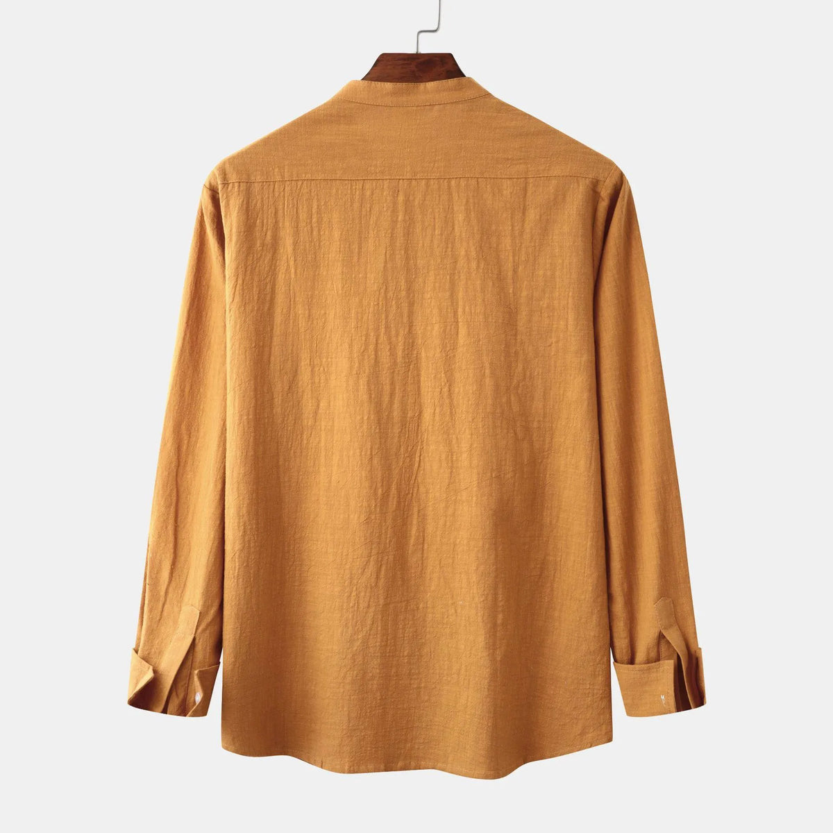 Men's slim-fit brown cotton blend long sleeve shirt and matching casual trousers laid flat.