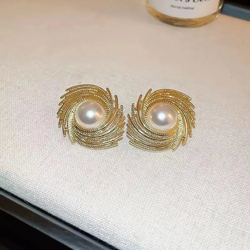 Women's vintage style flower earrings with pearl elements and electroplated alloy construction