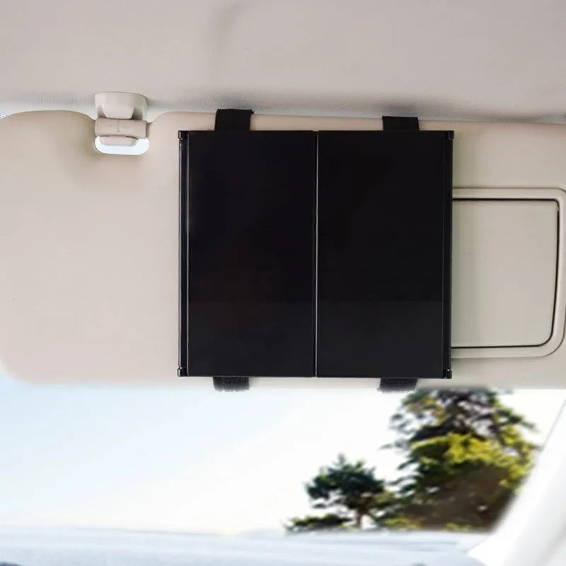 Silver car folding makeup mirror shown both closed at 15.5cm and open at 30.5cm width