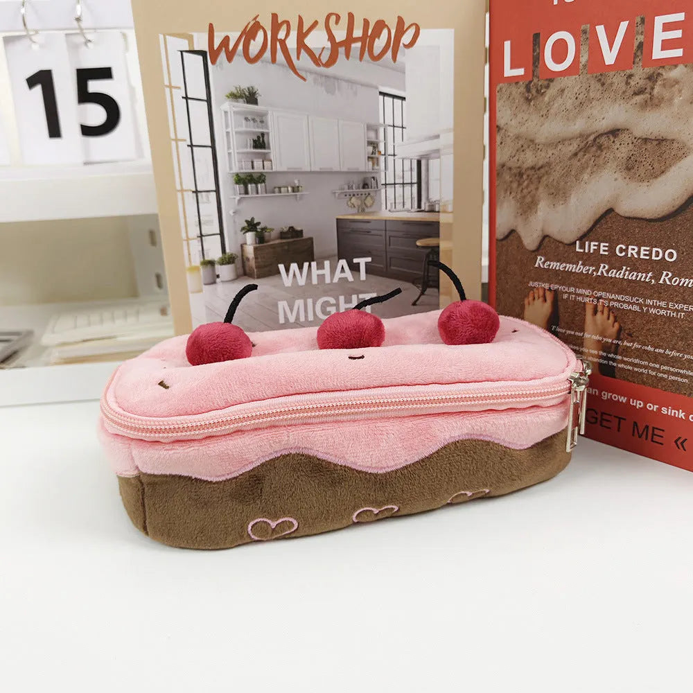 Korean style velvet pencil case with red and pink cherry cake plush design.