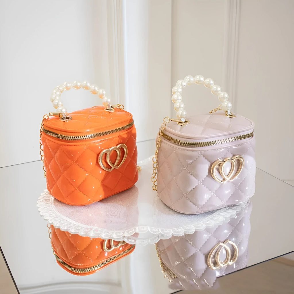 PVC bucket-style gel bag with heart pattern in apricot colour, suitable for cosmetic and toiletry storage