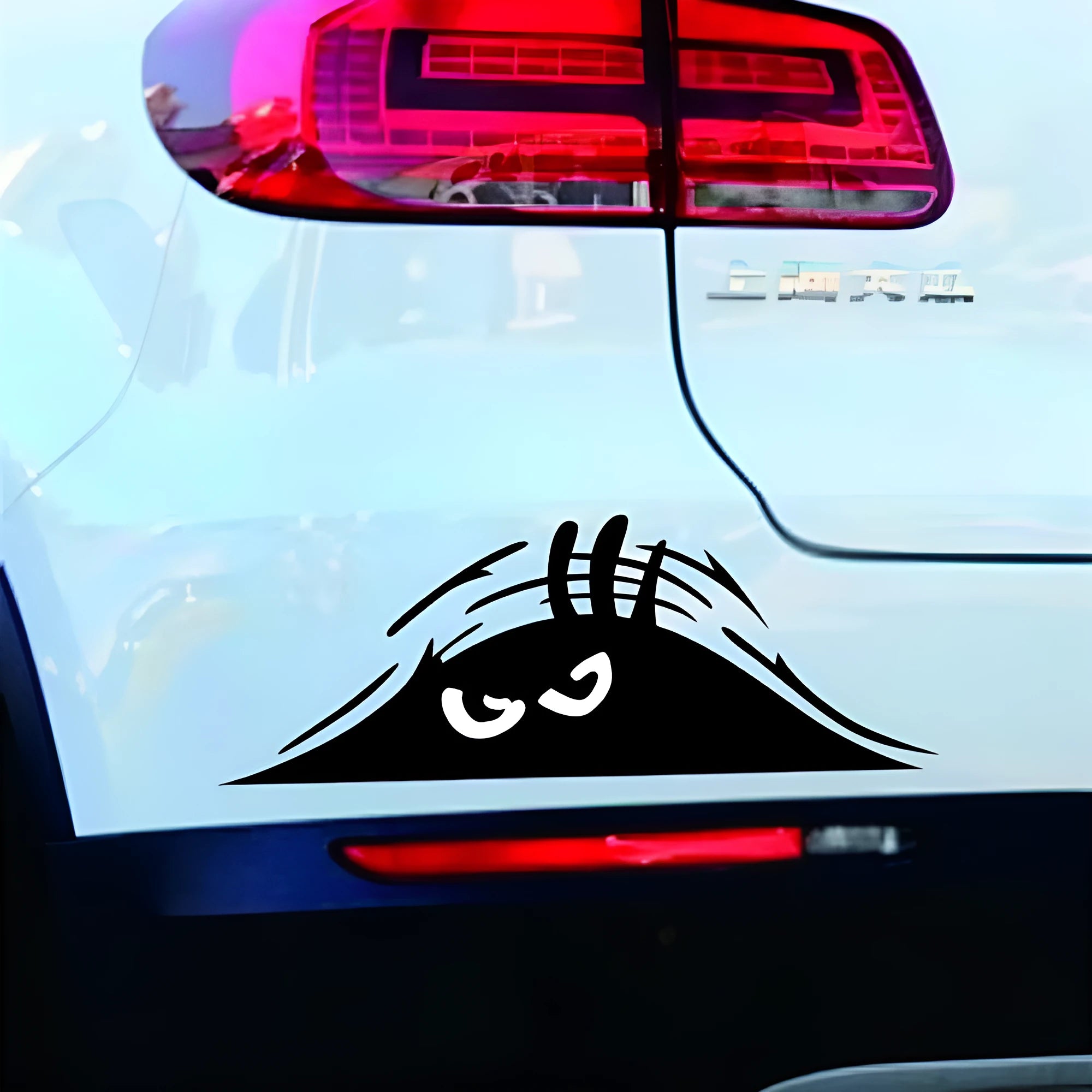 Large 19cm by 7cm self-adhesive body sticker showing four face design options.
