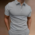 Men's grey loose fit button front short sleeve cotton blend t-shirt on a hanger