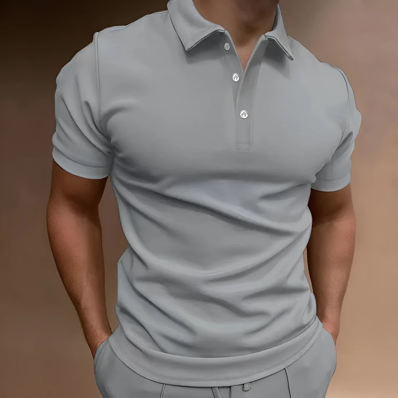 Men's grey loose fit button front short sleeve cotton blend t-shirt on a hanger