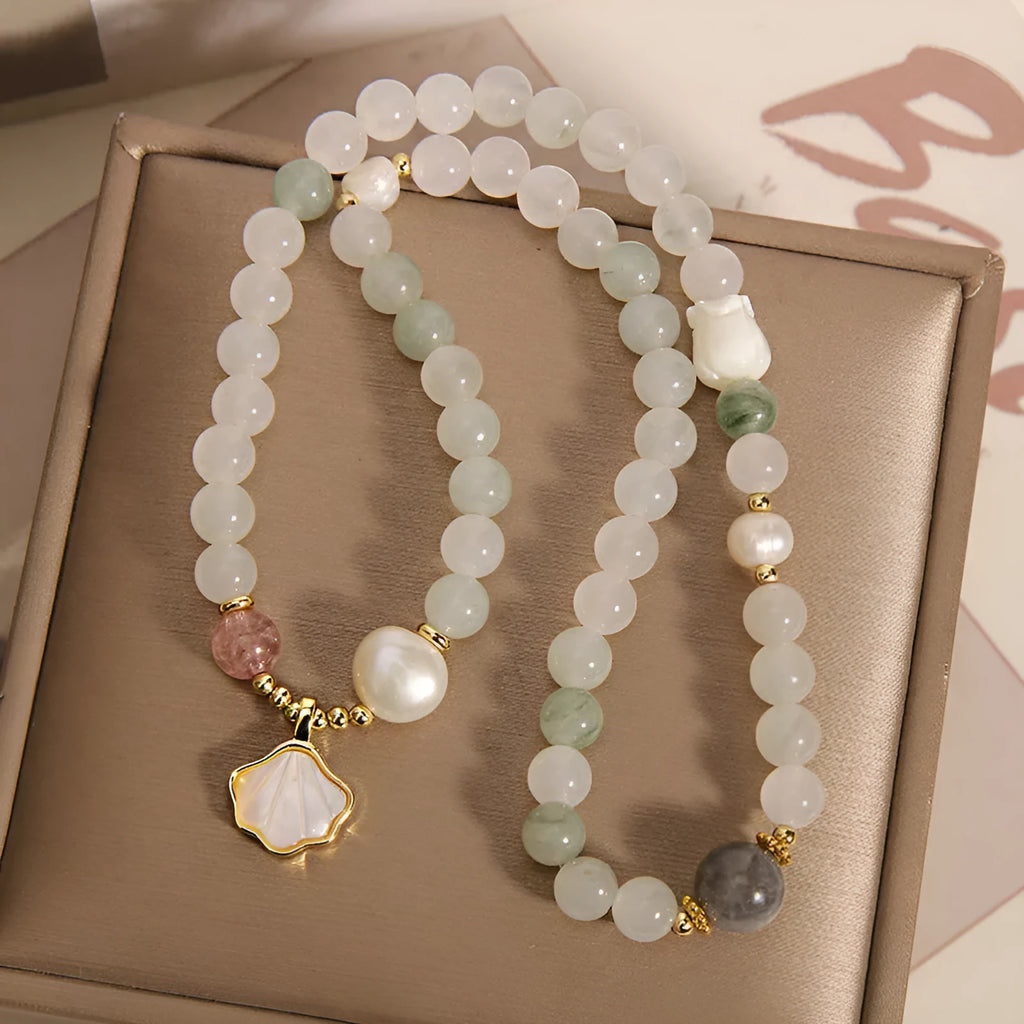 Tianshan jade emerald green crystal bracelet with gold-plated leaf pendant and rhinestone decoration