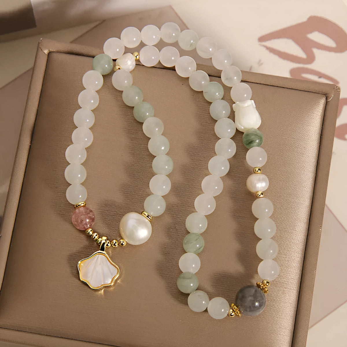 Tianshan jade emerald green crystal bracelet with gold-plated leaf pendant and rhinestone decoration