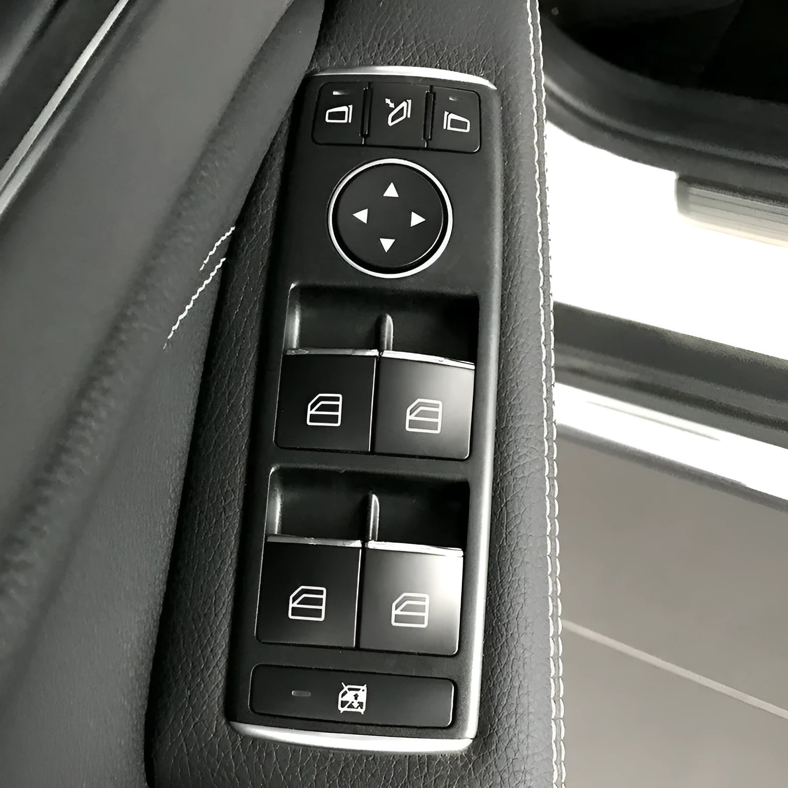 Black glitter adhesive sticker for covering a car window lift button.