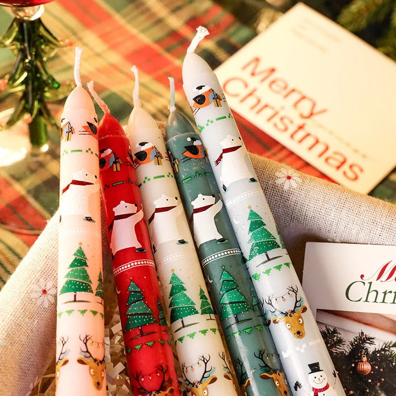 25cm Christmas pillar candle in paraffin, 2.2cm diameter, printed festive design, five colours available
