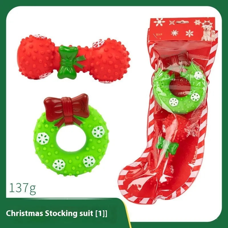 Christmas dog chew toys set with vinyl Santa heads, trees, and festive shapes in gift packaging