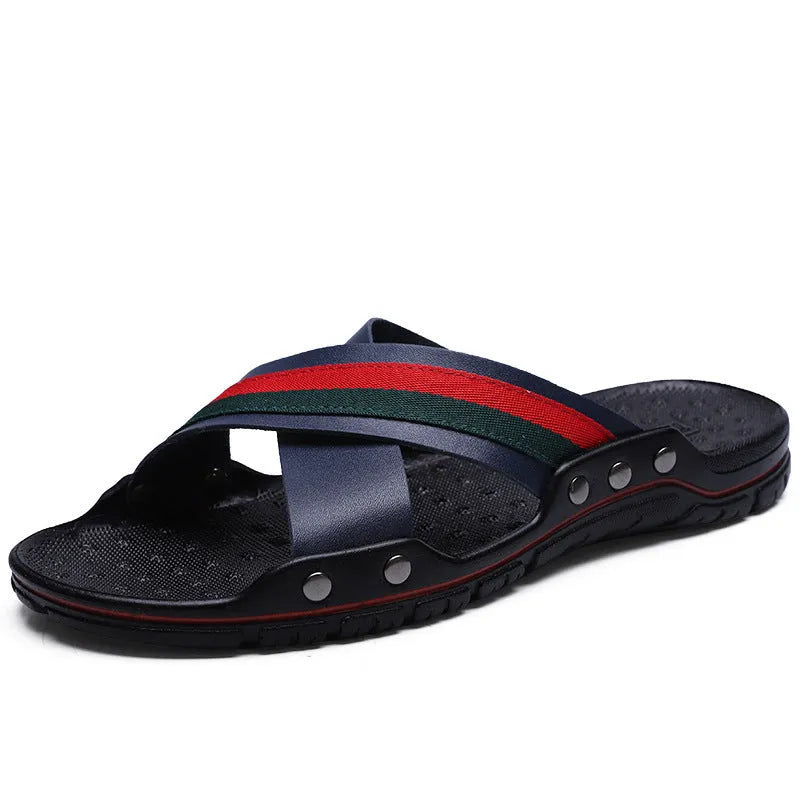 Men's cowhide leather flip-flops on a beach, showing black, blue and white colour options