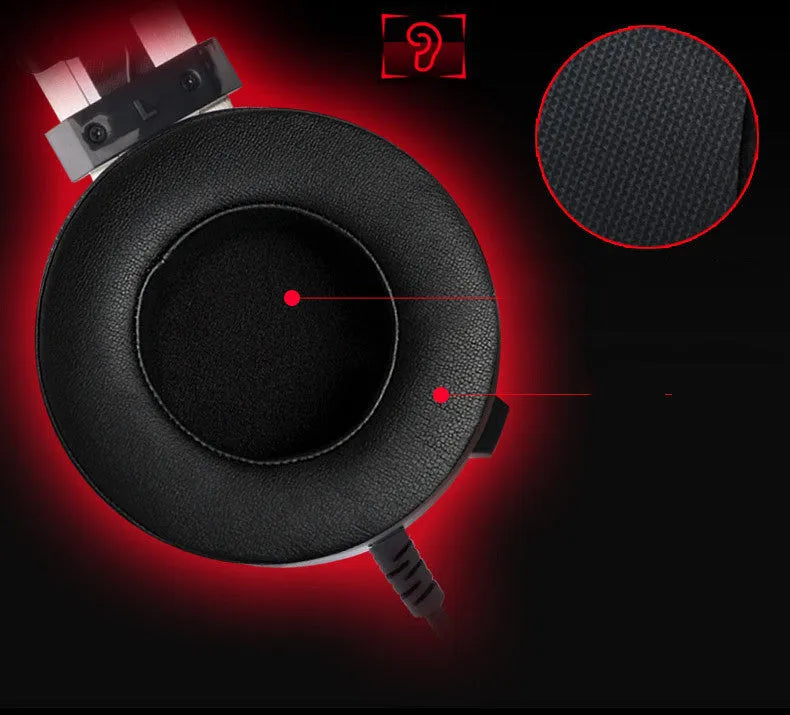 Black wired over-ear PC gaming headset with a 3.5mm plug and long cable.