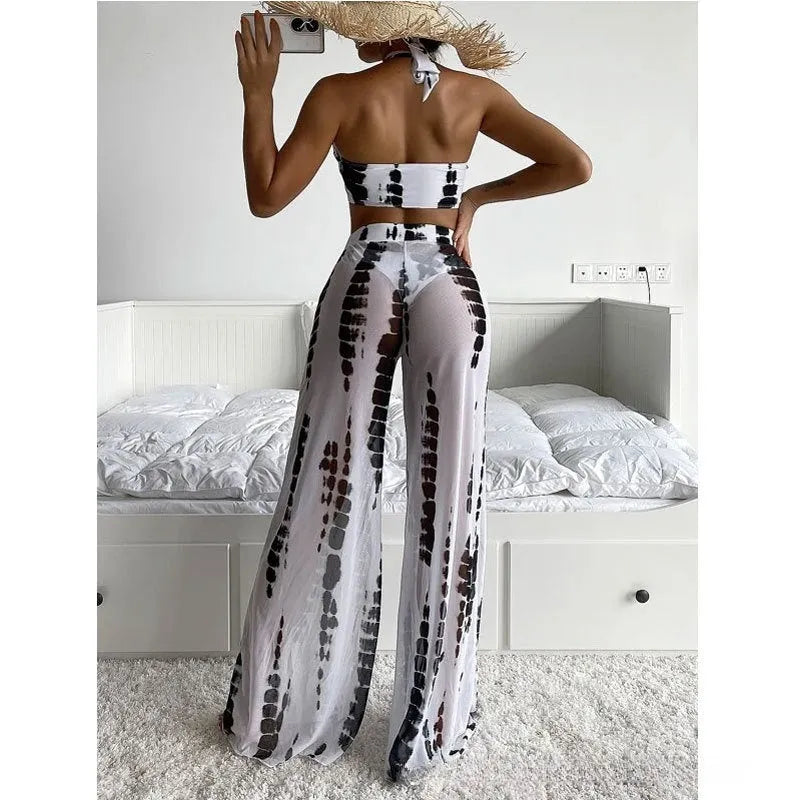 Women's three-piece bikini swimsuit with mesh trousers in black or blue printing design