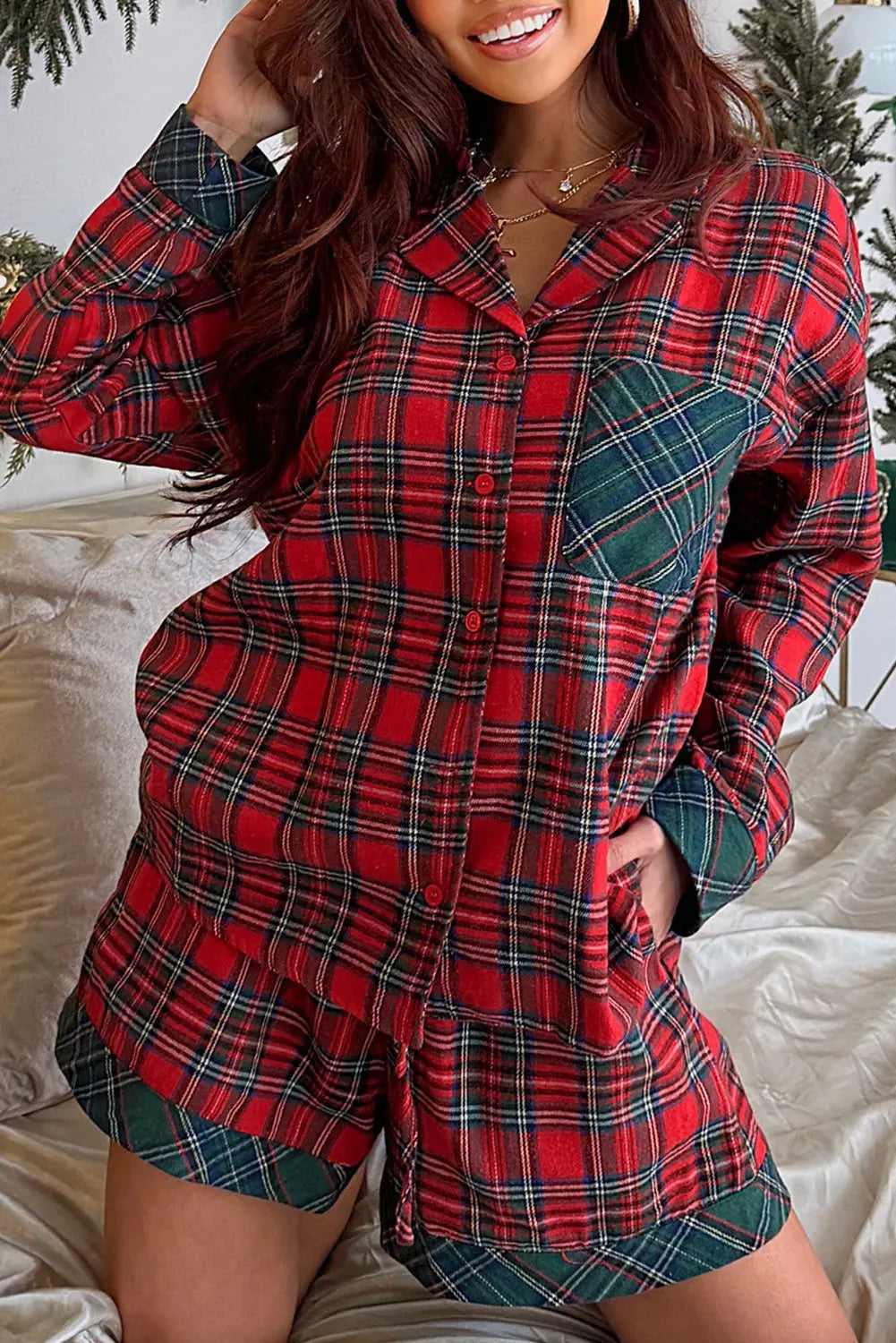Red plaid Christmas pyjama set with contrast patches showing long sleeve shirt and matching shorts