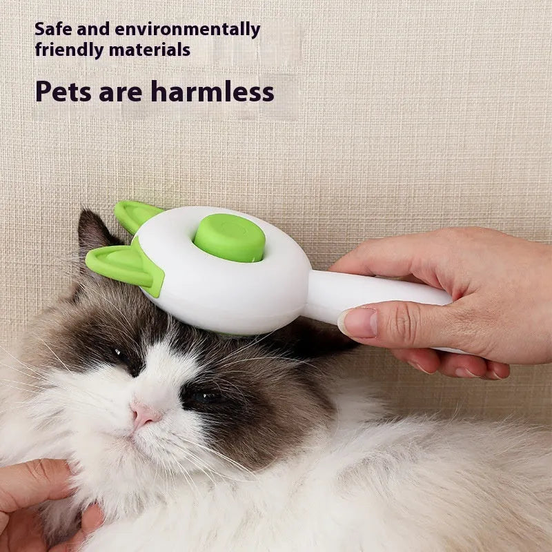 Self-cleaning cat grooming comb with stainless steel teeth and removable brush head in greenish white colour
