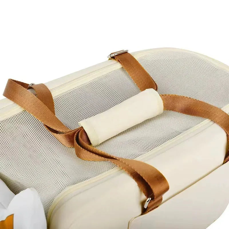 Beige hard-sided pet carrier flight case with central control panel for cats under 15kg