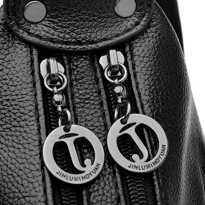 Large black women's shoulder bag with multiple internal organisation pockets and crossbody strap