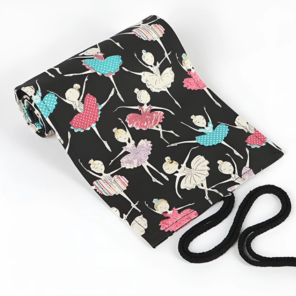 Canvas pencil case roll with ballet girl print, shown unrolled to display multiple pencil pockets.