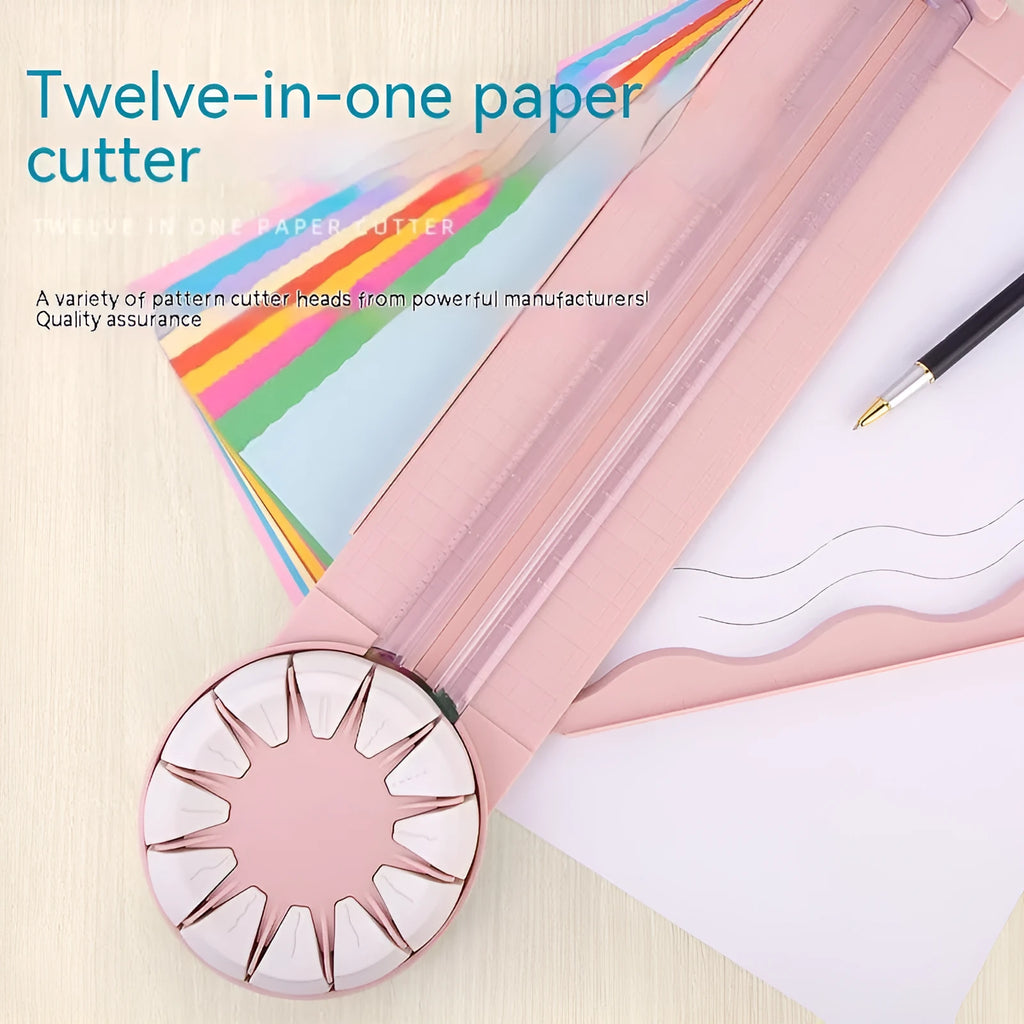 Pink plastic 12-in-1 paper cutting machine with dotted perforation wheel on craft table