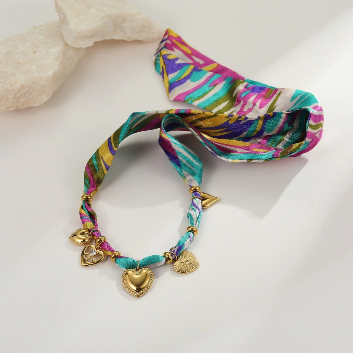 Stainless steel geometric pendant necklace with 18K gold electroplated finish and adjustable chain