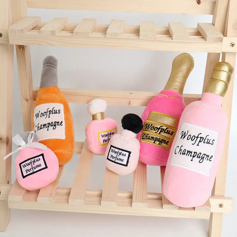 Plush wine bottle shaped pet toy for dogs and cats in assorted colours.