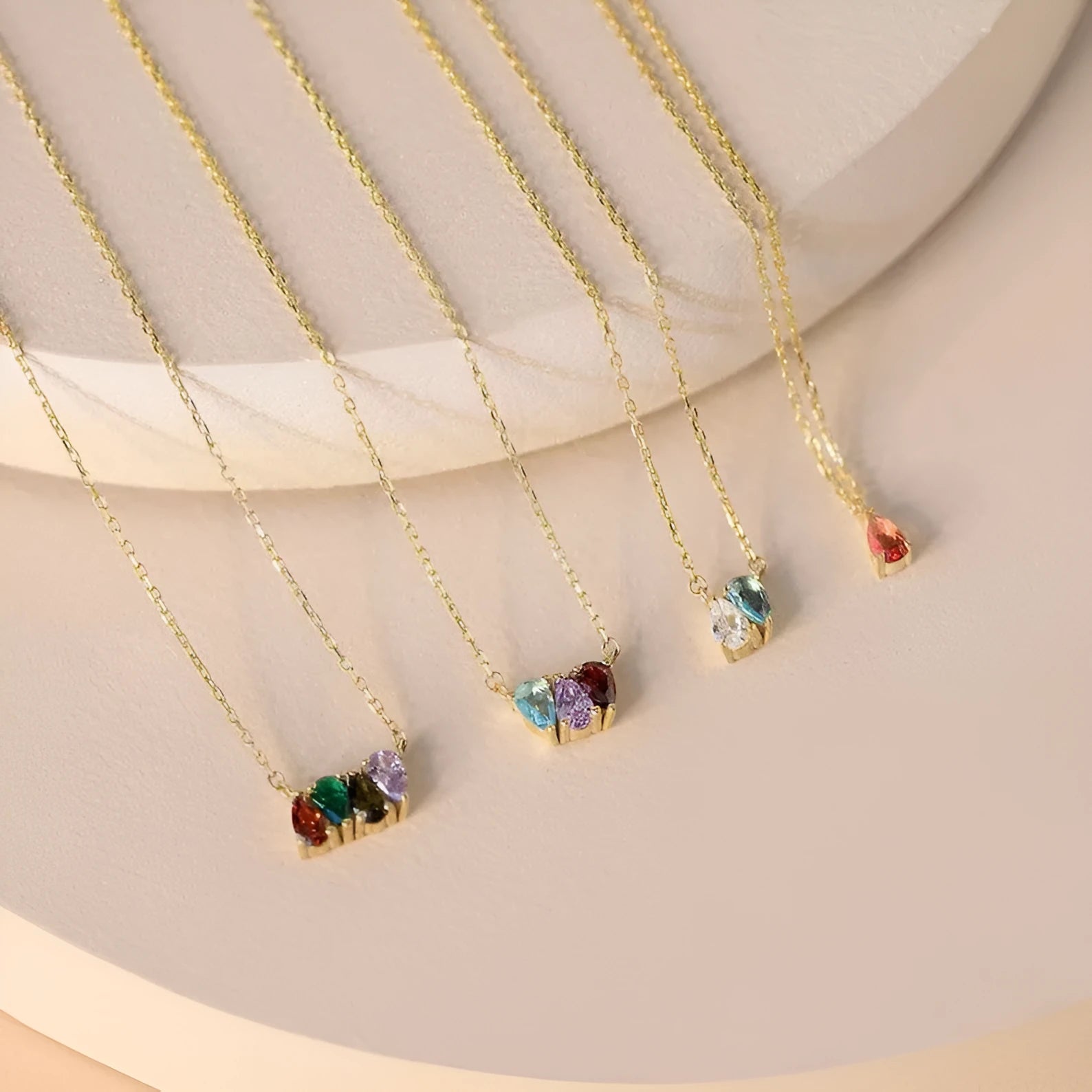 Zircon birthstone pendant on a titanium steel clavicle chain in silver, gold, or rose gold finish.