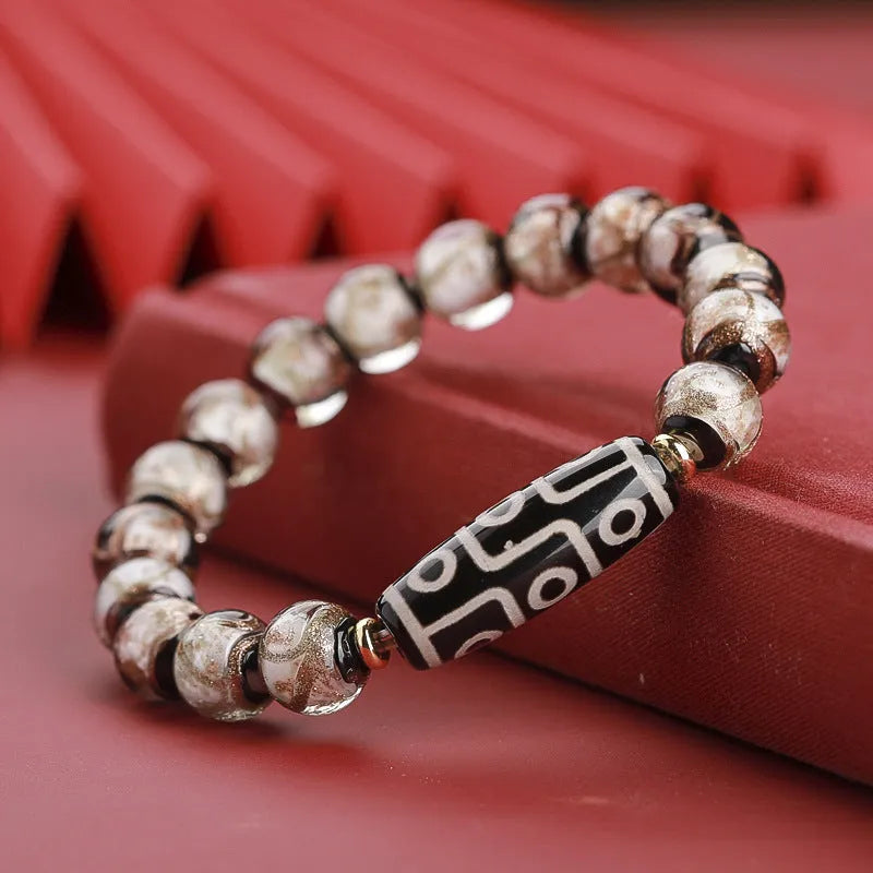 Chinese coloured glaze bracelet with snake beads in five-colour design, showing manual processing details