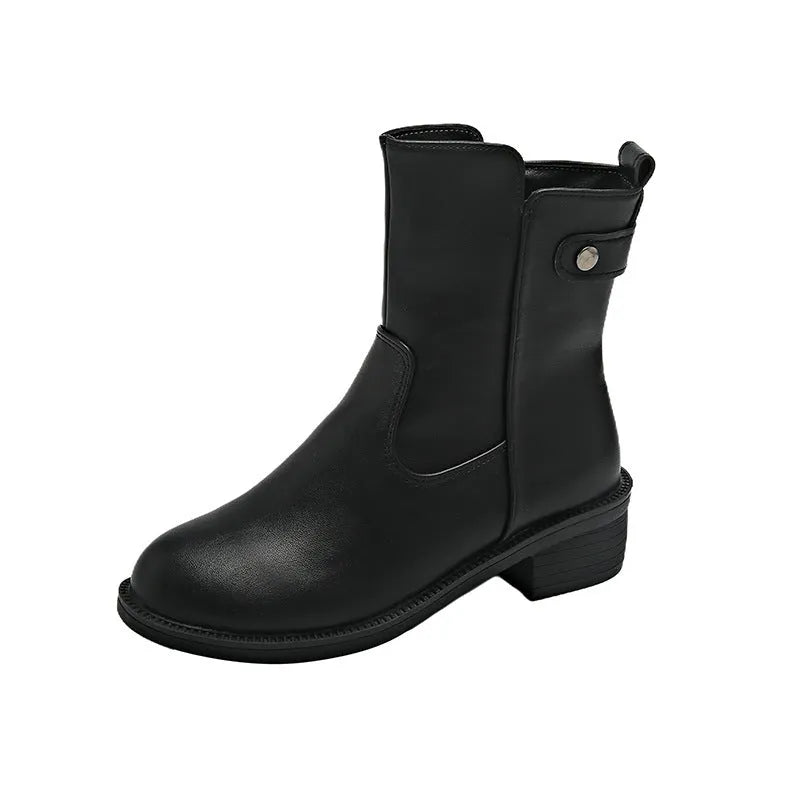Black women's low heel ankle boots with side zip and round toe on a rubber sole