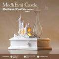 White medieval castle design waterless aromatherapy machine with ambient light on a table.