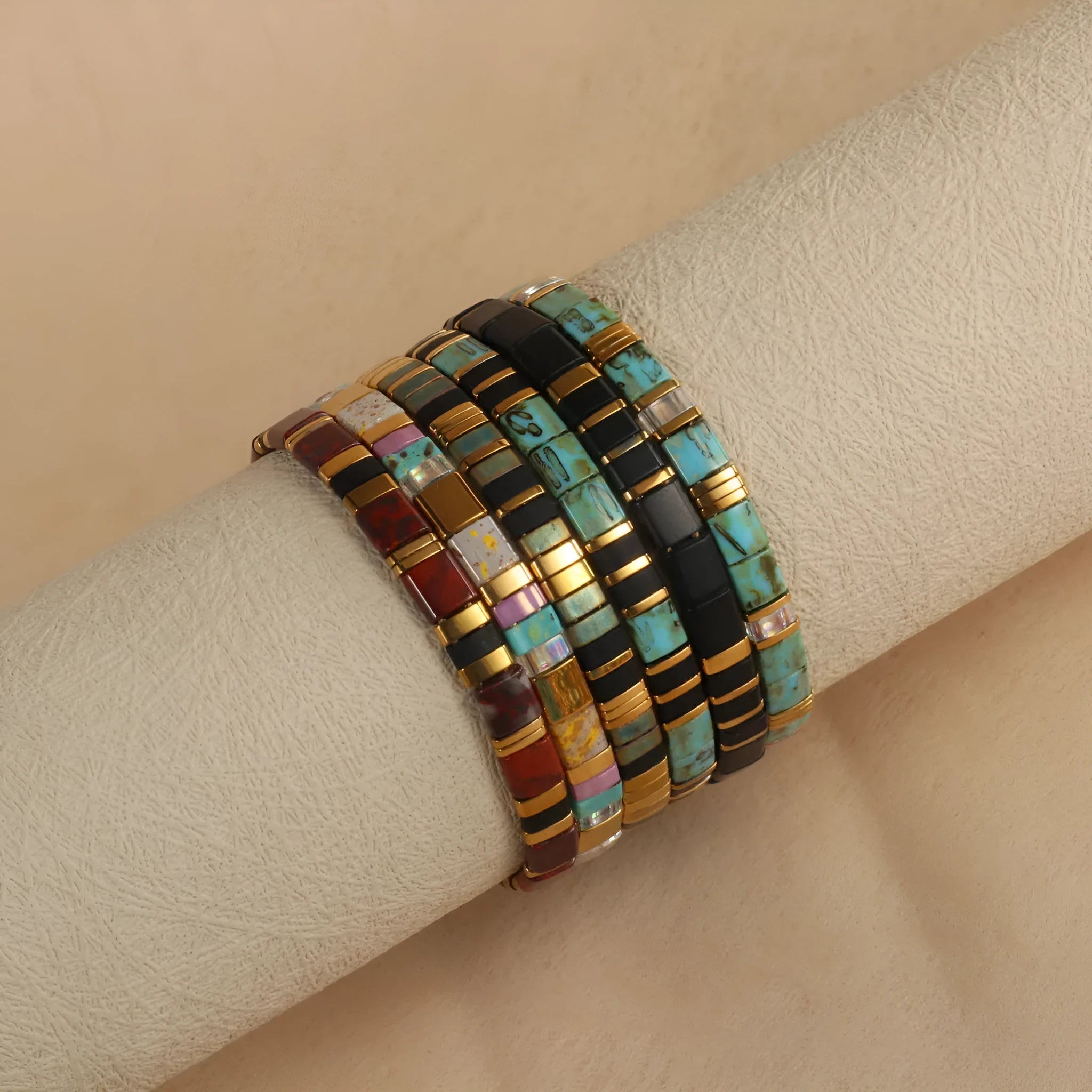 Geometric glass beaded bracelet in milky white, black, green, blue, or red with round elements