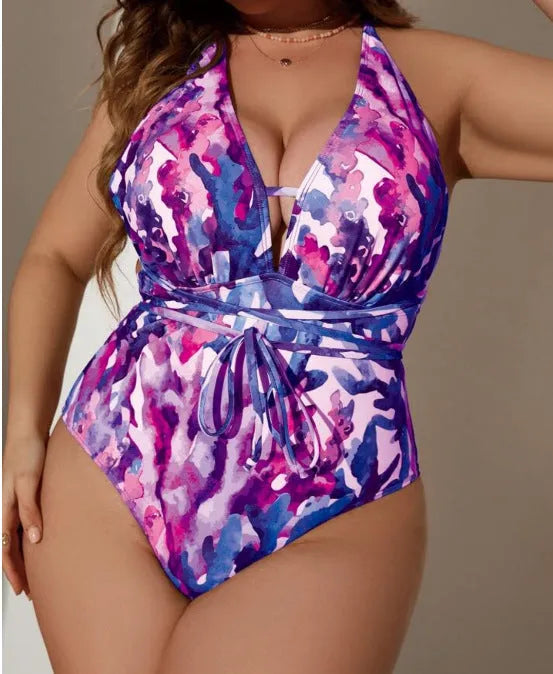 Women's solid colour one-piece halter swimsuit in blue or purple for swimming sports