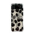 Samsung Galaxy Z Flip phone case with flower design on transparent hard shell