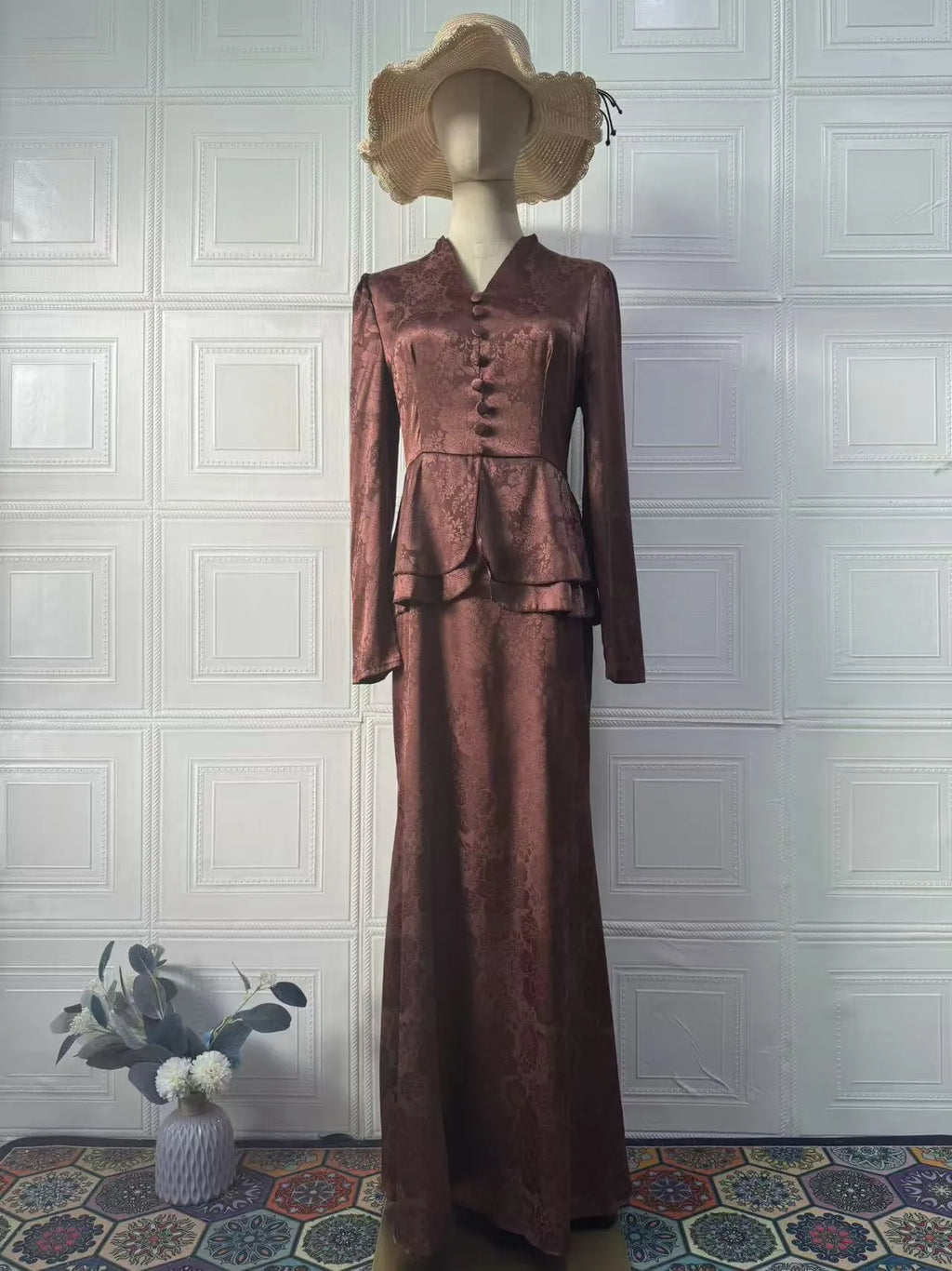 Dark brown women's retro dress with button front, long sleeves, and floral pattern.