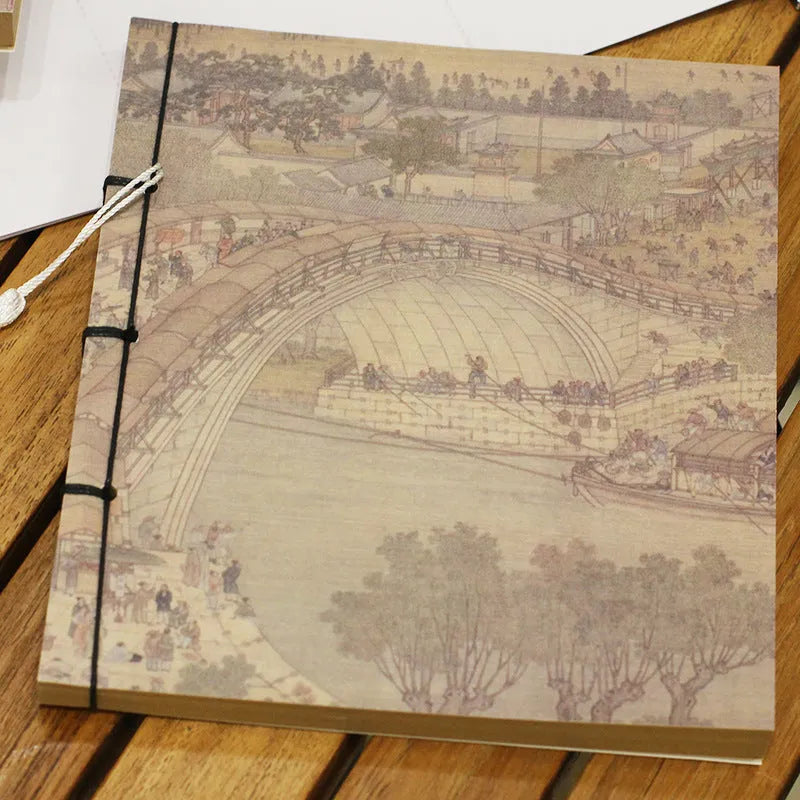 A5 antique wire-bound notebook with retro painting cover, thread binding, and black tassels.