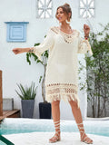 Apricot-coloured hand-crocheted beach dress for women on a mannequin.