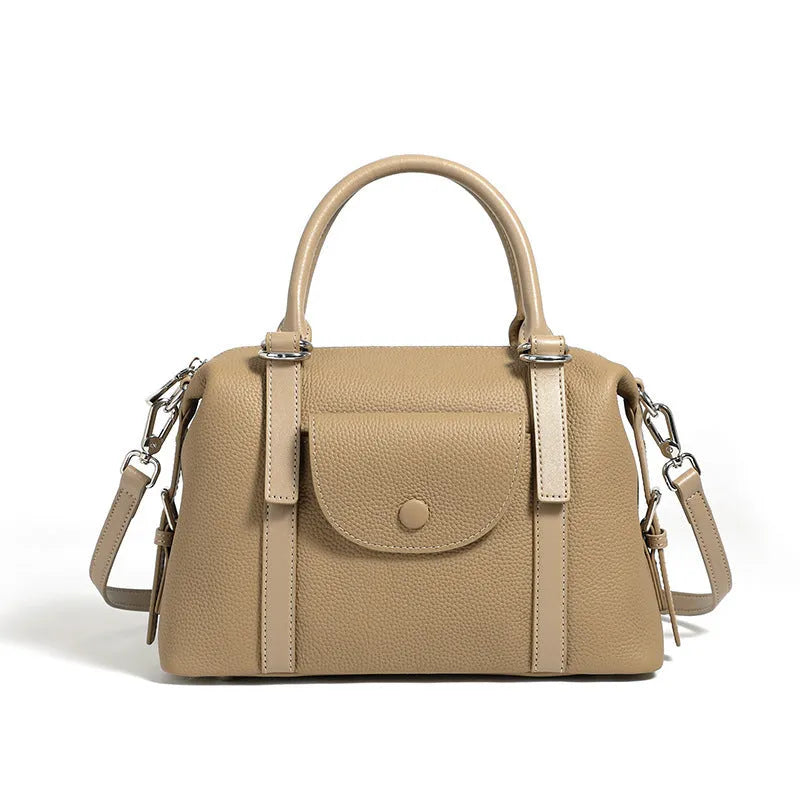 Genuine leather women's handbag with lock closure and single shoulder strap in street trend style