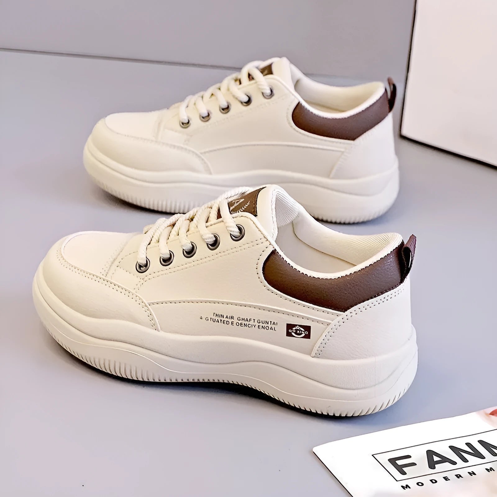 Women's Korean-style white leather shoes with cross straps and lace-up front