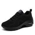 Red and black women's low-top mesh sneakers with round toe and front lace-up.