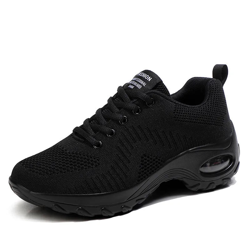 Red and black women's low-top mesh sneakers with round toe and front lace-up.