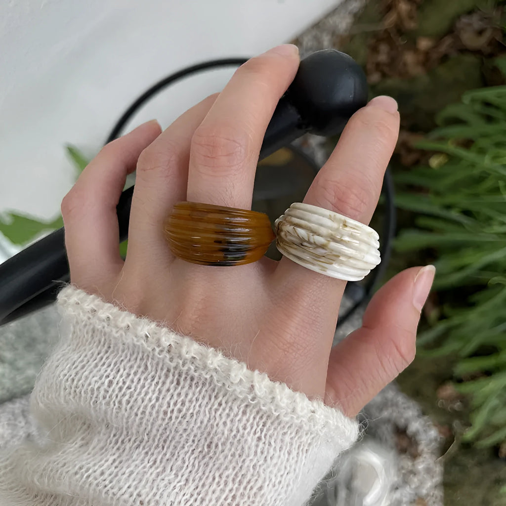 Geometric irregular resin ring in free size, shown in Maillard brown colour.