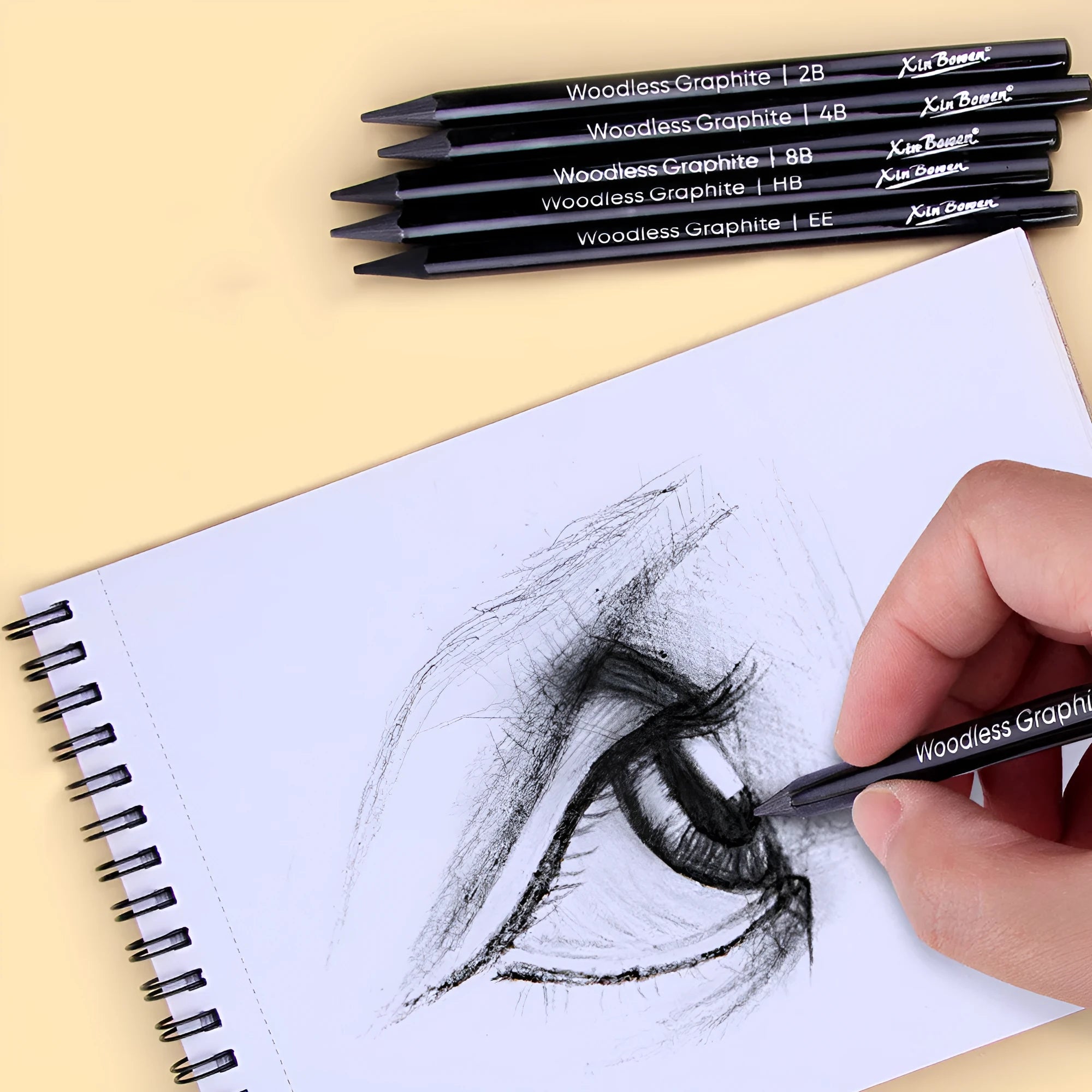 Set of six wood-free graphite full lead sketching pencils in grades HB, 2B, 4B, 6B, 8B, and EE.