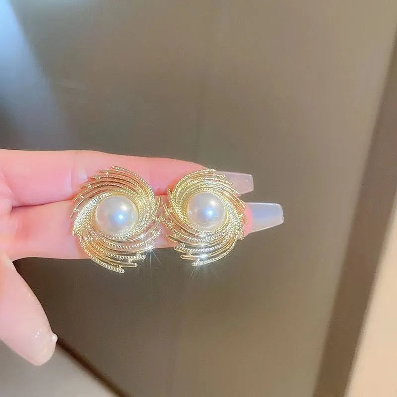 Women's vintage style flower earrings with pearl elements and electroplated alloy construction